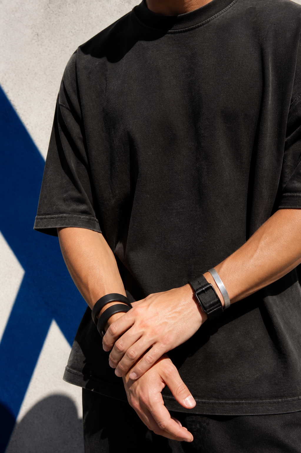 Community member wearing the core tee and wrist accessories